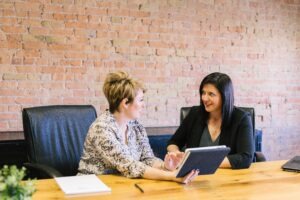 Women in accountability meeting or mentoring.